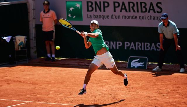 开云体育官网-张奔斗：再入大满贯正赛，18岁商竣程大器早成